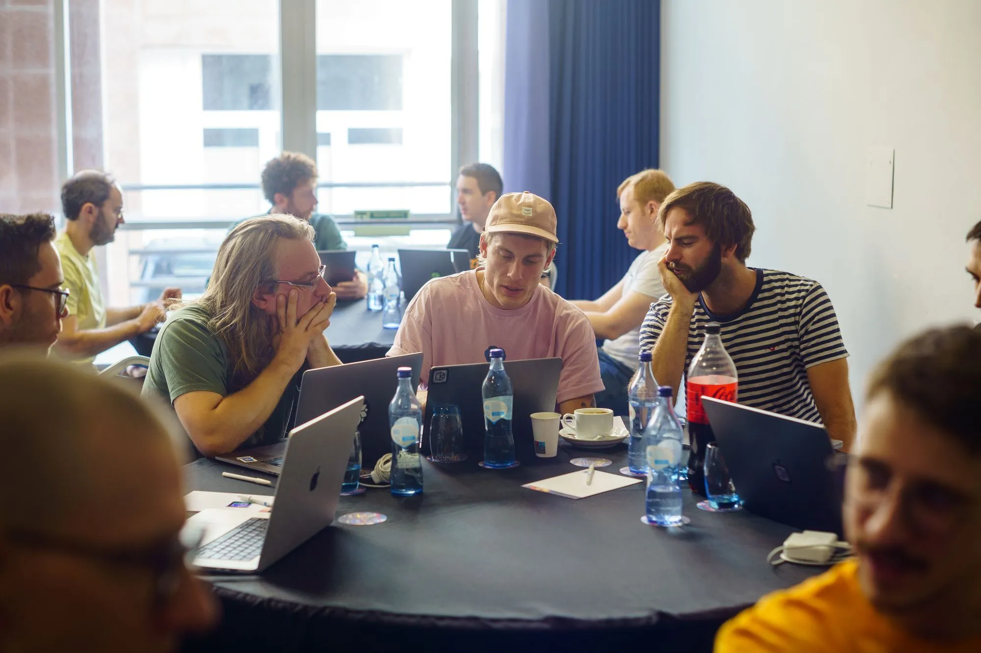 Our developers Pascal and Alex, with UX UI designer Marius (middle) – totally not waiting for an exceeded Figma file to load.